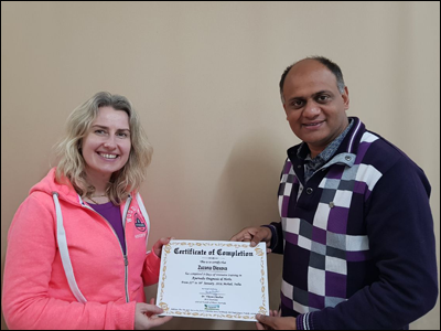 Dr. Vikram Chauhan (MD-Ayurveda) Presenting 8 Days Training Certificate to Ms. Zuzana Olexova at Planet Ayurveda Centre