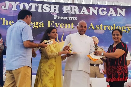 Dr. Meenakshi Chauhan being Awarded by Sh. Kaptan Singh Solanki (Honorable Governor of Punjab & Haryana)