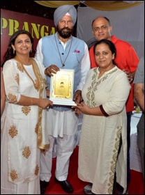 Dr. Meenakshi Chauhan being Awarded by Rana Gurmeet Singh Sodhi (Sports and Youth Affairs Minister of Punjab)